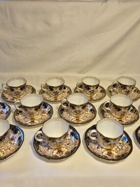 Royal Crown Derby Black, Gold and White Gilt Floral Teacup and Saucer Set